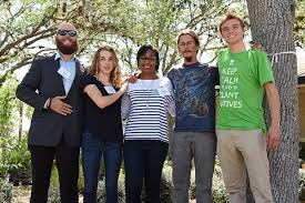 Portrait of NPHF Members and Wilcox standing together